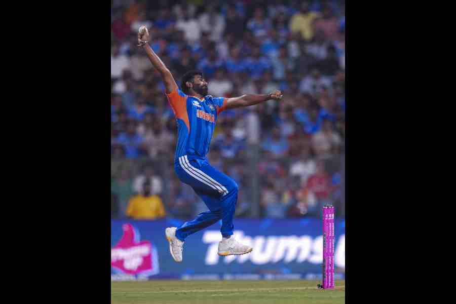 Jasprit Bumrah bowls a delivery during the ICC Men's T20 World Cup 2026 second semifinal cricket match between India and England, at the Wankhede Stadium, in Mumbai, Maharashtra, Thursday, March 5, 2026.