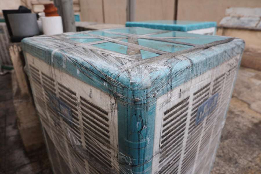 Black soot on an air conditioner after reported black rain following a strike on fuel tanks, amid the U.S.-Israeli conflict with Iran, in Tehran, Iran
