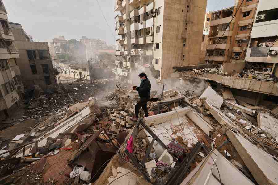 Smoke rises following an Israeli airstrike in Dahiyeh, Beirut's southern suburbs, Lebanon, Saturday, March 14, 2026.