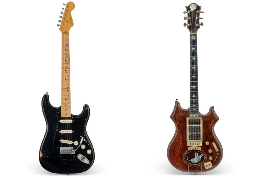(L) David Gilmour’s black Fender Stratocaster — the famed ‘Black Strat and (R) Jerry Garcia’s legendary ‘Tiger’ guitar