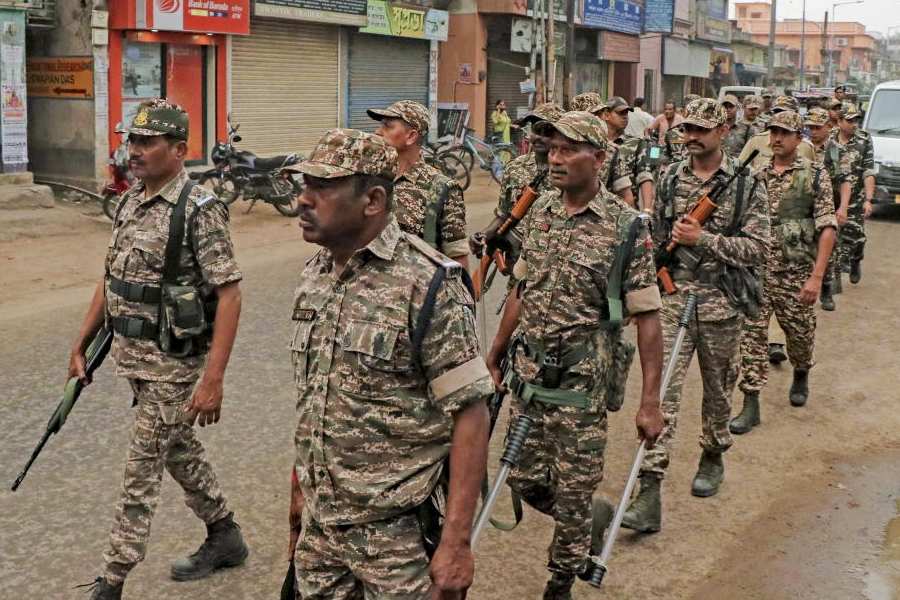 Paramilitary personnel conduct a route march ahead of the announcement of West Bengal Assembly election dates by the Election Commission, in Bolpur, Birbhum district of West Bengal, Thursday, March 12, 2026.