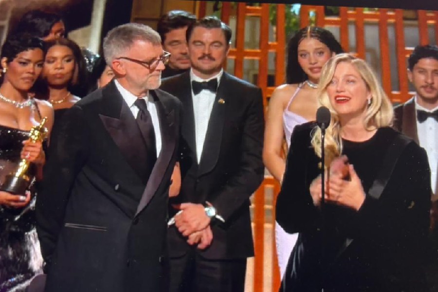 'One Battle After Another' team on Oscars stage