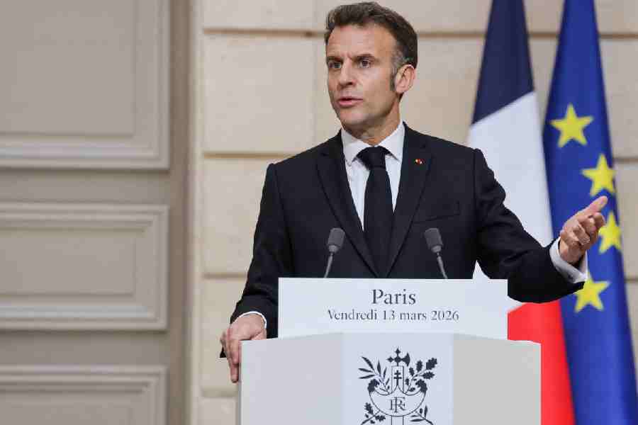 France's President Emmanuel Macron delivers a speech during a joint press conference with Ukraine's President Volodymyr Zelensky, in Paris, March 13, 2026.