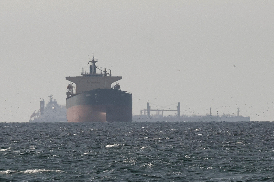 FILE PHOTO: Tankers sail in the Gulf, near the Strait of Hormuz, as seen from northern Ras al-Khaimah, near the border with Oman’s Musandam governance, amid the U.S.-Israeli conflict with Iran, in United Arab Emirates, March 11, 2026.