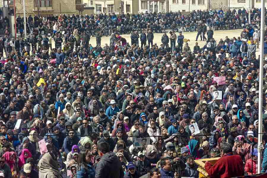 People gather during a protest demanding inclusion under the Sixth Schedule of the Constitution, in Leh, Ladakh, Monday, March 16, 2026