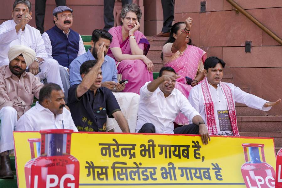 Congress MP Priyanka Gandhi Vadra, Hibi Eden, and Prashant Padole staging a protest against the LPG crisis at Parliament House, New Delhi.