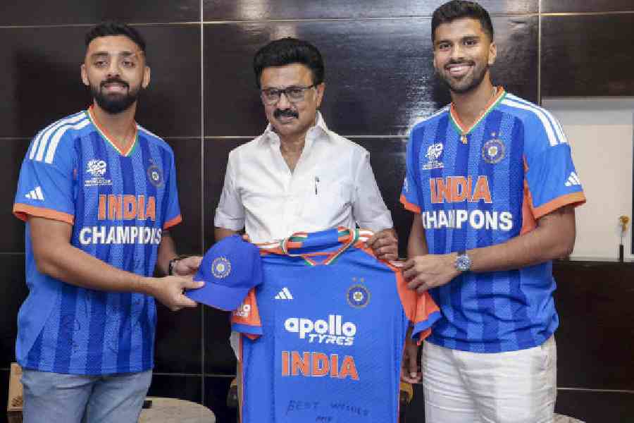 Varun Chakravarthy and (right) Washington Sundar with Tamil Nadu chief minister MK Stalin in Chennai. “Memorable moments with our spin twins...,” Stalinposted on X on Monday. (PTI picture)