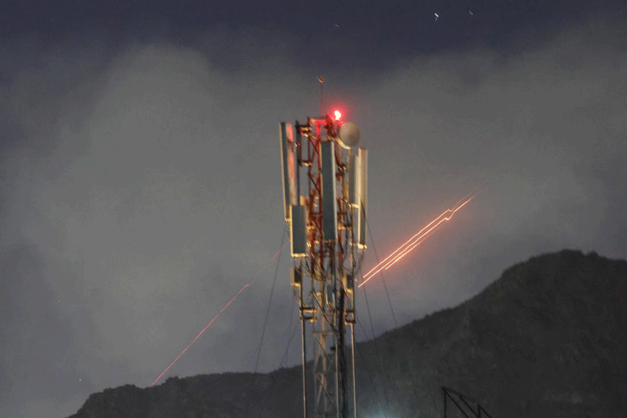 Tracers from anti-aircraft fire after an explosion in what the Taliban said was a Pakistani air strike in Kabul