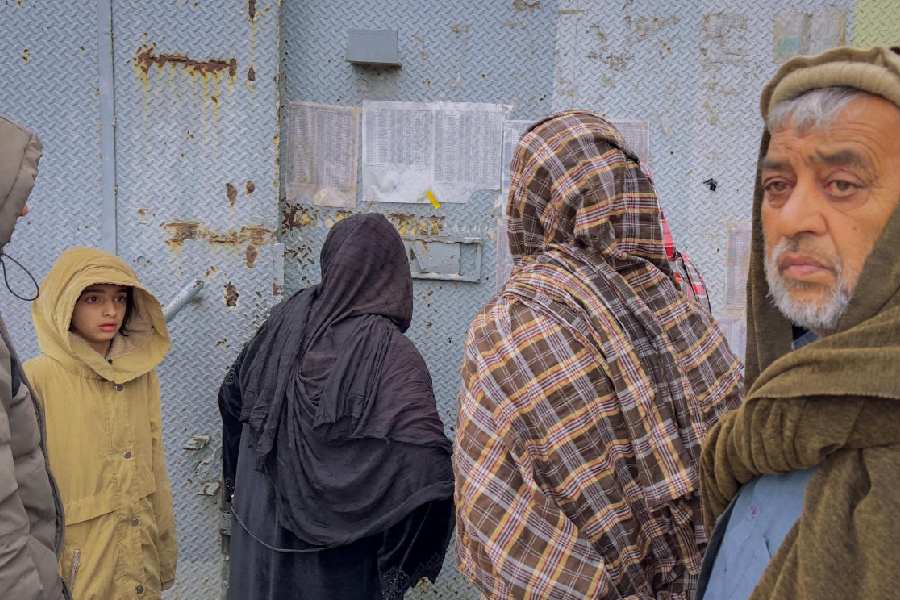 Afghans  names of missing relatives at a Kabul drug rehabilitation centre destroyed in what the Taliban said was a Pakistani airstrike