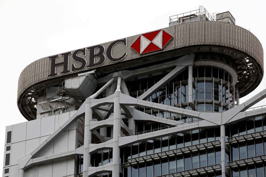 FILE PHOTO: Logo of HSBC is seen on its headquarters at the financial Central district in Hong Kong
