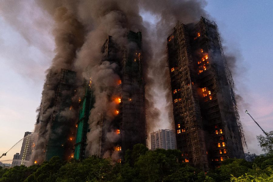 Smoke rises after a fire broke out at Wang Fuk Court, a residential estate in the Tai Po district of Hong Kong\'s New Territories