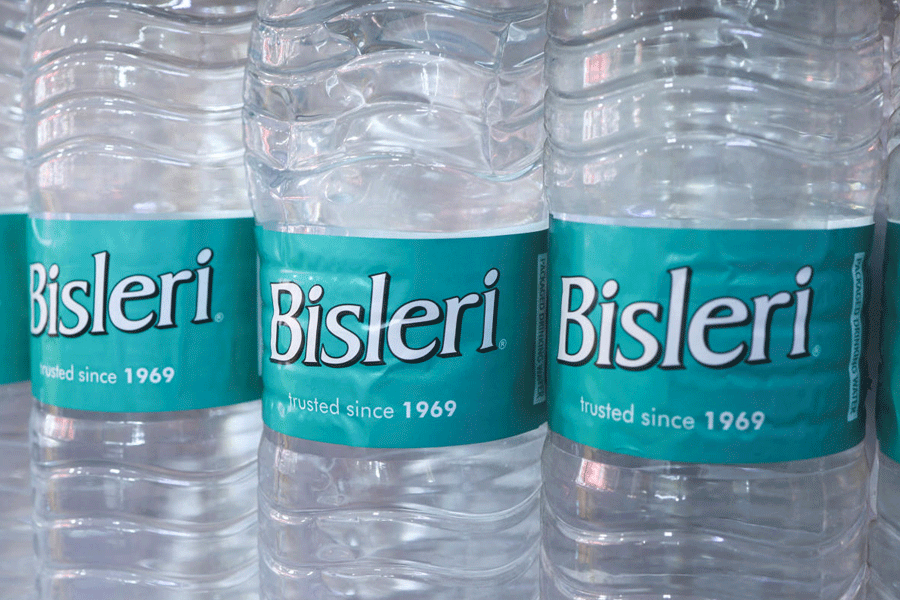 Bisleri packaged drinking water bottles stacked inside a shop for sale in Kolkata