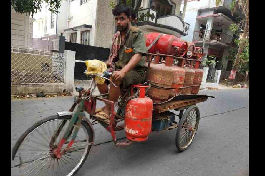 An LPG delivery man in Sarat Abasan.