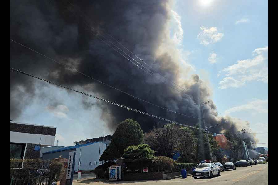 Smoke rises from at a car parts factory in Daejeon, South Korea.