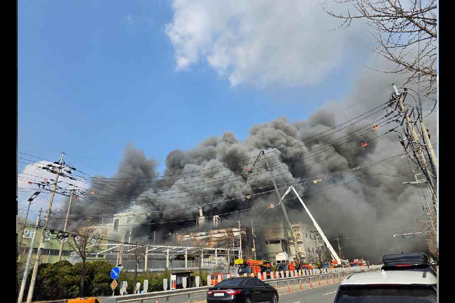 Smoke rises from a car parts factory in Daejeon, South Korea