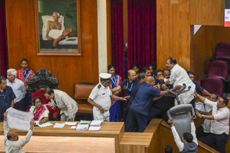 Odisha Assembly paralysed SCB Hospital fire Mukesh Mahaling resignation