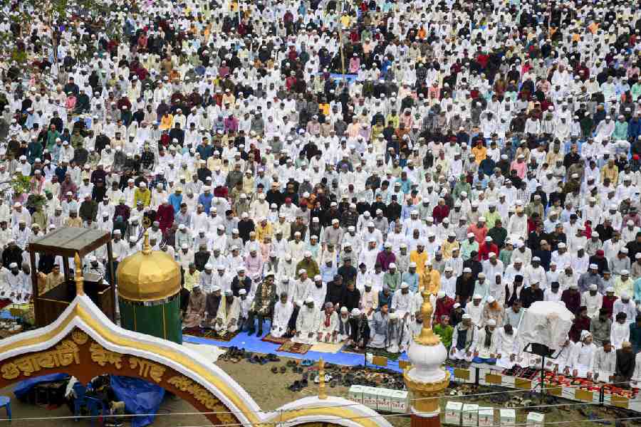 Muslims offer prayers for Eid al-Fitr, at an Eidgah in Guwahati, Assam, Saturday, March 21, 2026.