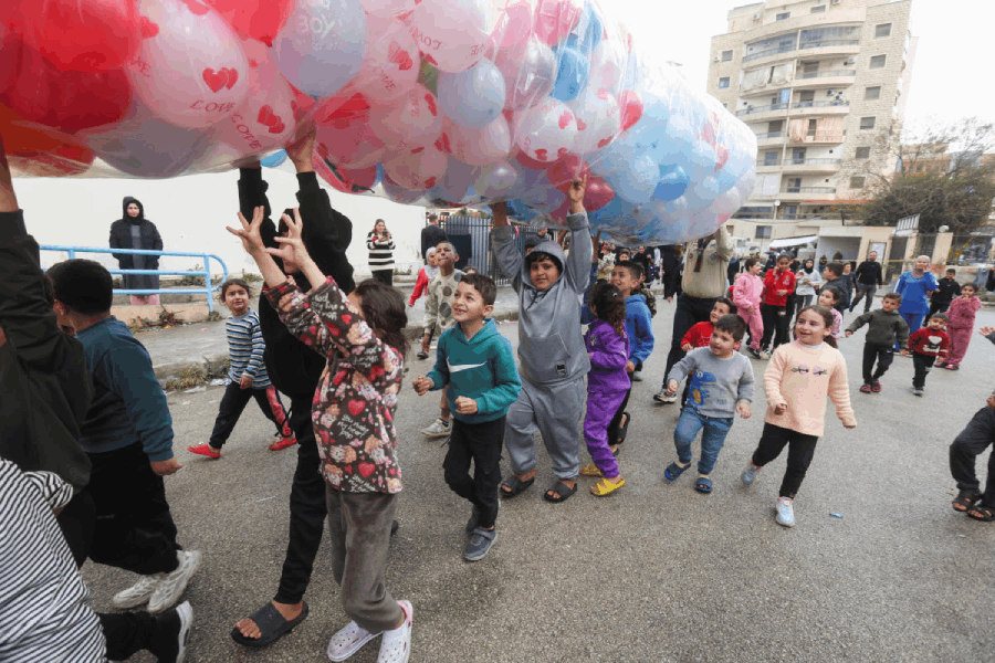 Children gather during an activity organized by a group of scouts inside a school in Sidon on the first day of Eid al-Fitr, following an escalation between Hezbollah and Israel amid the U.S.-Israeli conflict with Iran southern Lebanon, March 20, 2026. 
