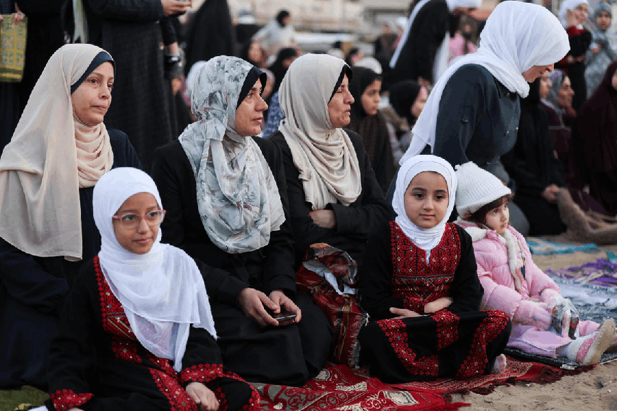 Palestinian Muslims attend Eid al-Fitr prayer marking the end of the holy fasting month of Ramadan in Gaza City, March 20, 2026. 