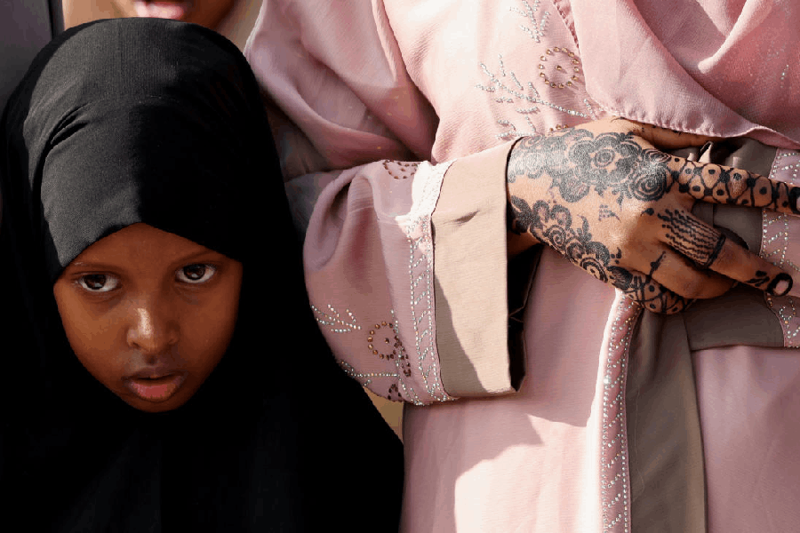 A Muslim girl attends Eid al-Fitr prayers, marking the end of the fasting month of Ramadan, at the Sir Ali Muslim Club Ground in Ngara district of Nairobi, Kenya March 20, 2026. 