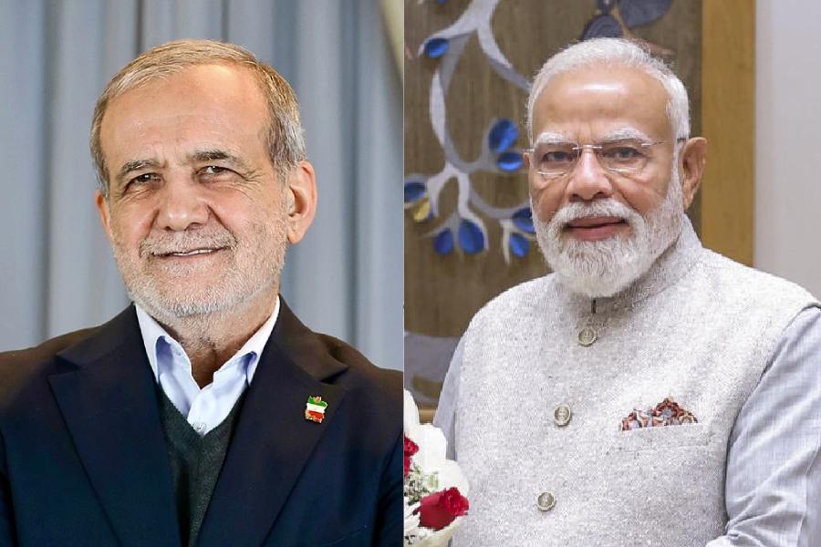 Masoud Pezeshkian (left), Narendra Modi