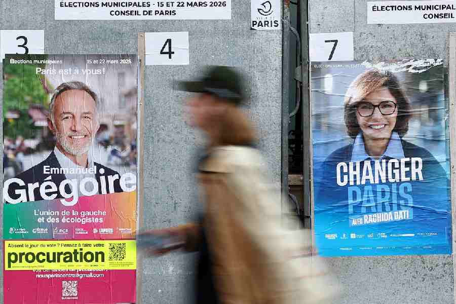 Posters of the Paris mayoral election candidates Emmanuel Gregoire and Rachida Dati