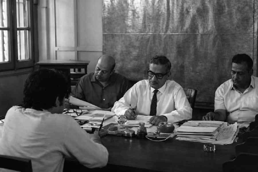 These scenes from Ray's 1970 film Pratidwandi shows the protagonist Siddhartha appear before an interview panel. Such preliminary interviews can now be conducted by AI. 