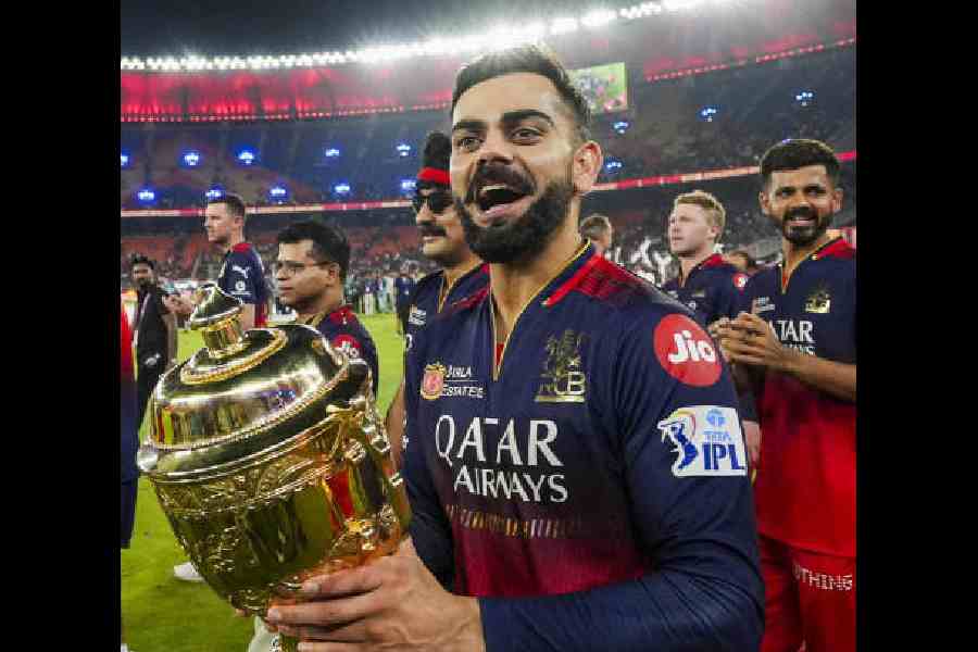 Virat Kohli with the IPL 2025 trophy followingRCB’s triumph. (PTI)