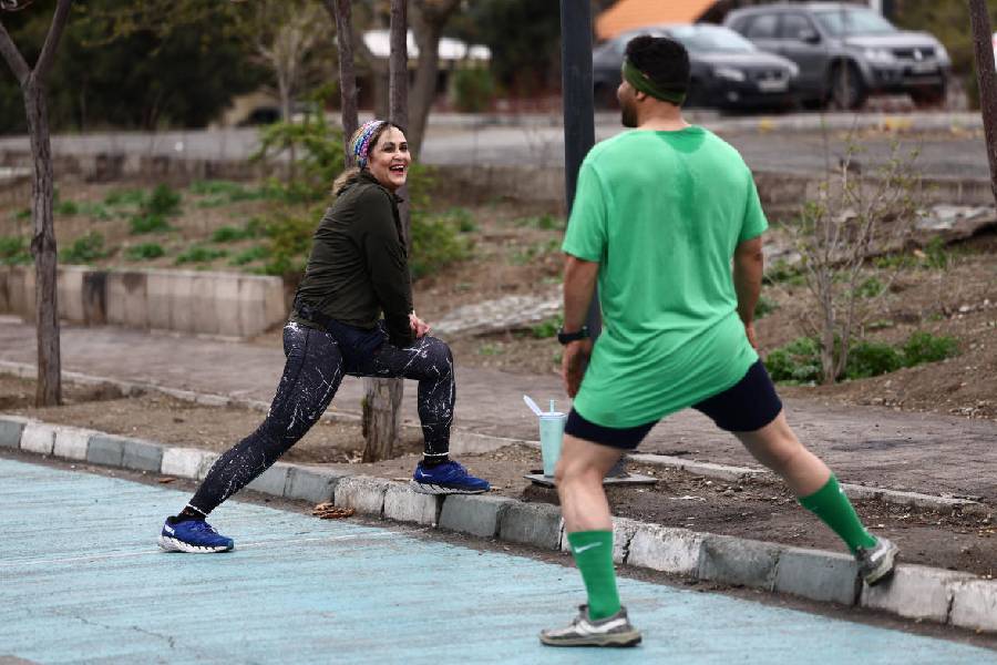 An Iranian woman exercises at Pardisan Park, amid the US-Israeli conflict with Iran, in Tehran, Iran, March 25, 2026.