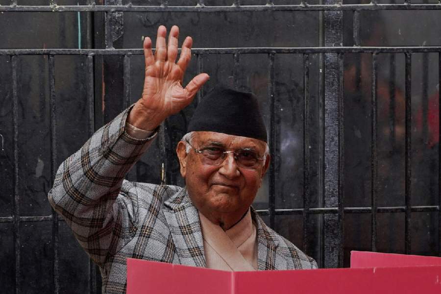 Former Prime Minister of Nepal and Chairman of Communist Party of Nepal (Unified Marxist- Leninist) K.P Sharma Oli, who was forced to resign after the deadly youth-led protests against corruption early September last year, waves ahead of voting during the general election in Bhaktapur, Nepal, March 5, 2026