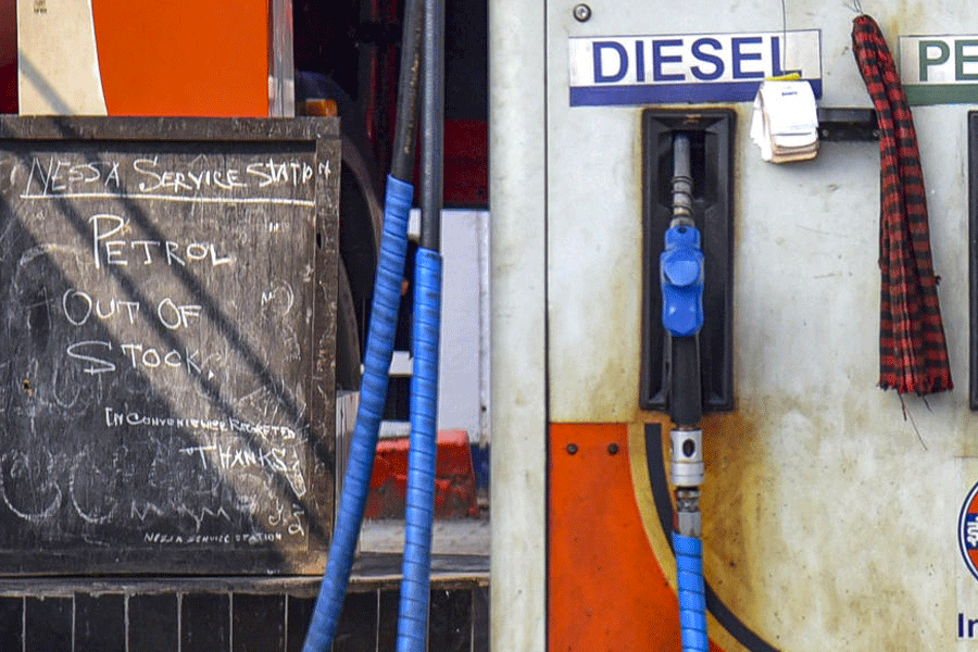 A notice at a petrol pump reads, "Petrol out of stock", amid rumours of fuel shortage in the wake of the West Asian conflict, in Guwahati, Assam, Thursday, March 26, 2026.