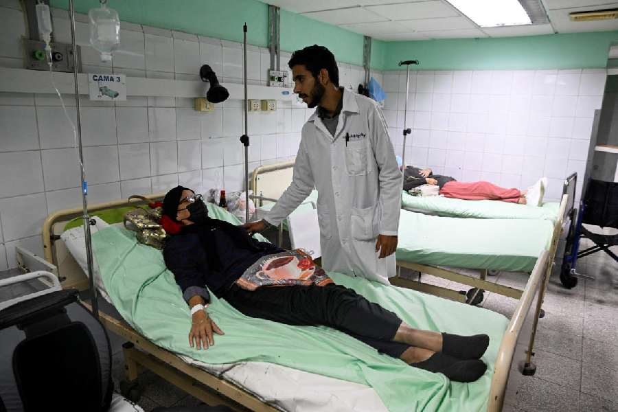A doctor talks to a patient at a public hospital,  in Havana, Cuba, March 18, 2026. 