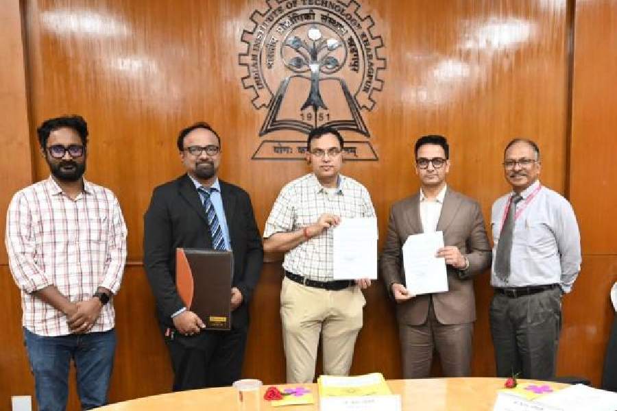 IIT Kharagpur director Suman Chakraborty (centre); MD of Charnock Hospital, Prashant Sharma (fourth from left), and others after the signing of the MoU on Thursday