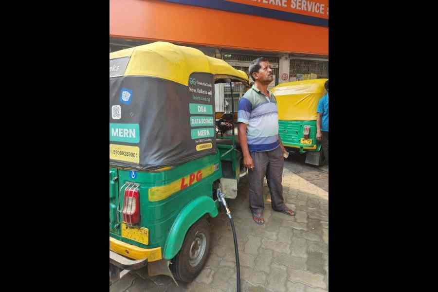 A driver finally receives LPG at the City Centre pump on Tuesday. 