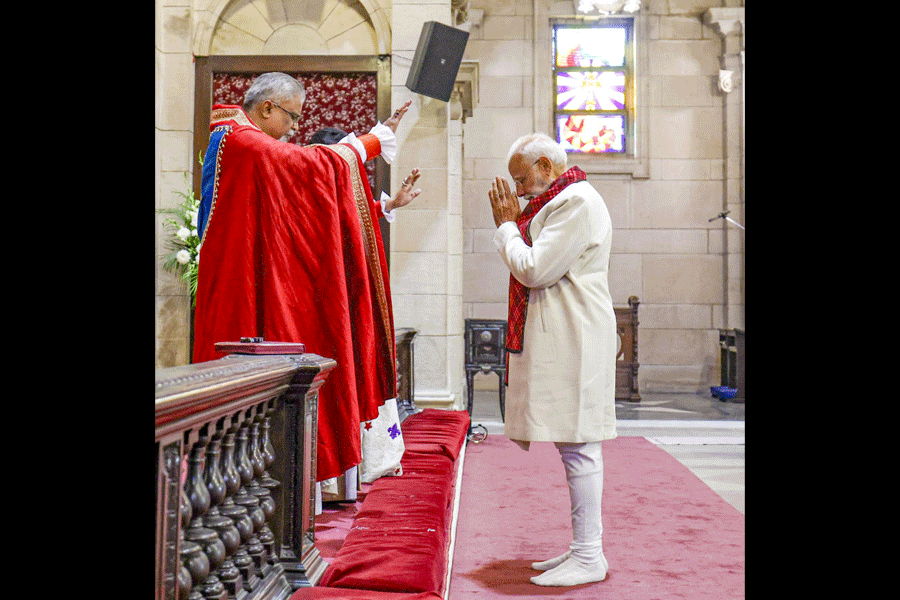 Prime Minister Narendra Modi during the Christmas morning service at the Cathedral Church of the Redemption in New Delhi.