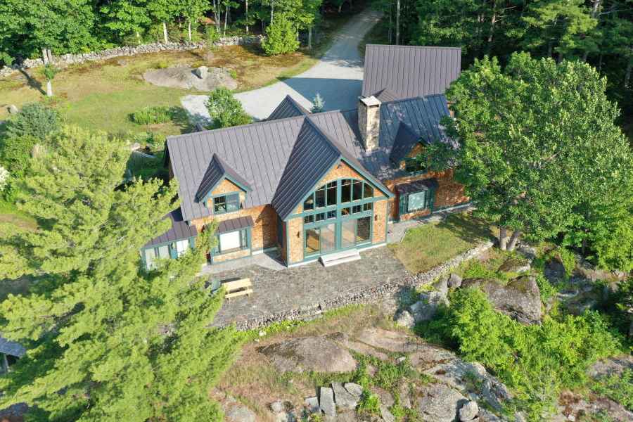 The property where Ghislaine Maxwell, former associate of late disgraced financier Jeffrey Epstein, was arrested by the Federal Bureau of Investigation (FBI) is seen in an aerial photograph in Bradford, New Hampshire, US July 2, 2020.