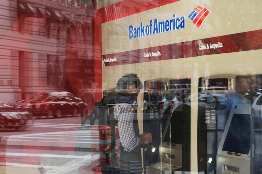 FILE PHOTO: Customer uses an ATM at a Bank of America branch in Boston