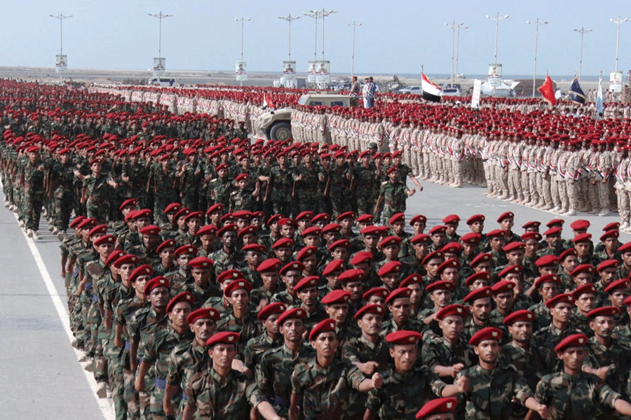 FILE PHOTO: Members of Houthi military forces parade in the Red Sea port city of Hodeida