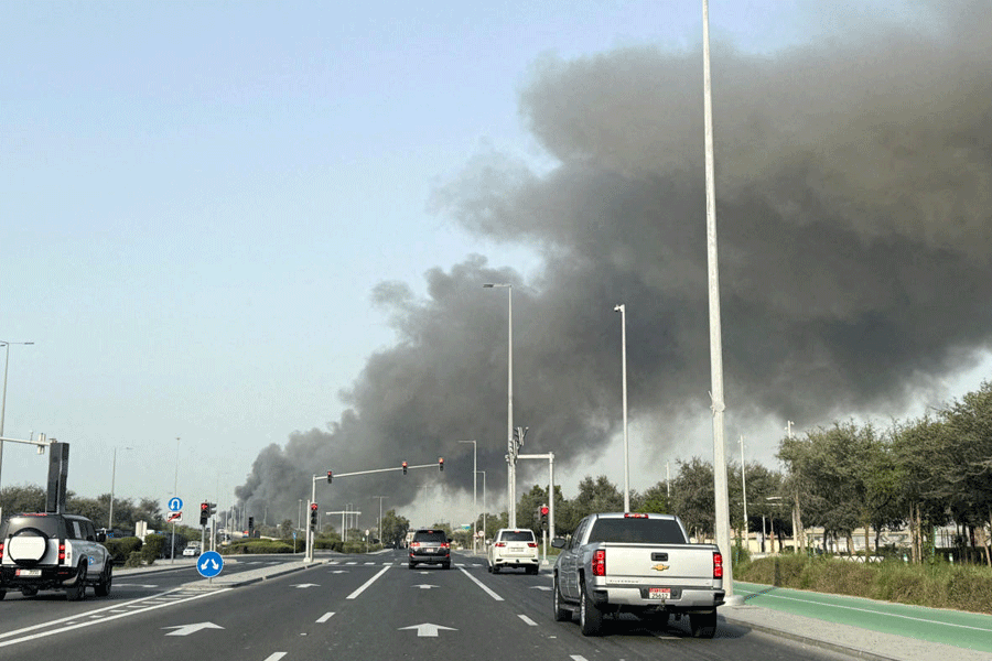 FILE PHOTO: Smoke billows from Zayed port after an Iranian attack, following United States and Israel strikes on Iran, in Abu Dhabi