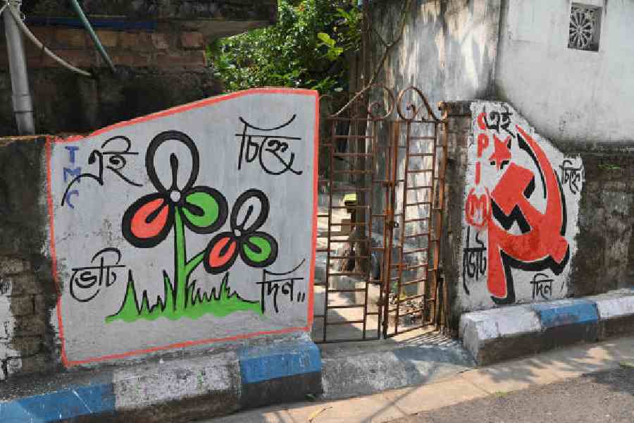 Election graffiti on the walls of a Patuli home. Picture by Sanat Kr Sinha