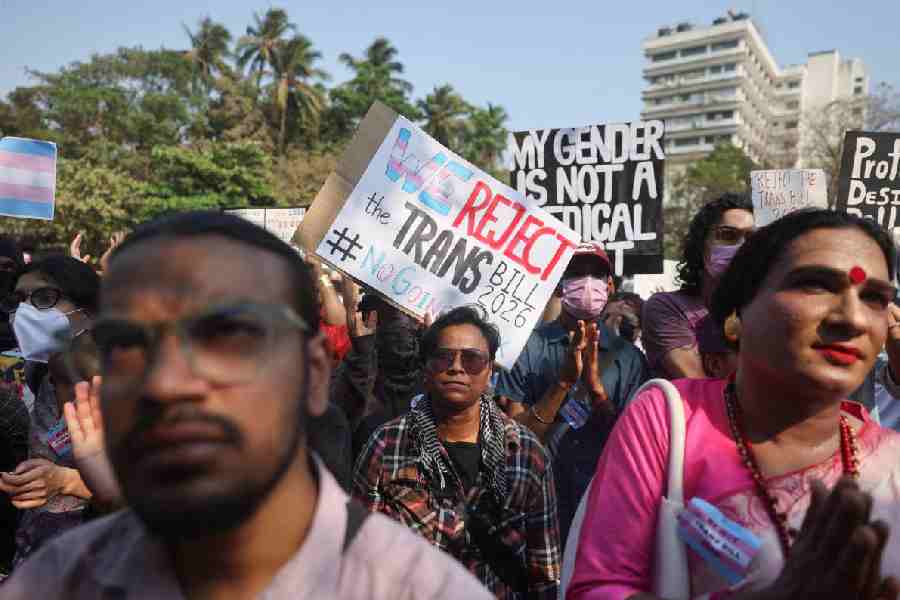 LGBTQIA+ community members hold placards during a protest demanding the withdrawal of the Transgender Amendment Bill 2026, in Mumbai, India, March 25, 2026.