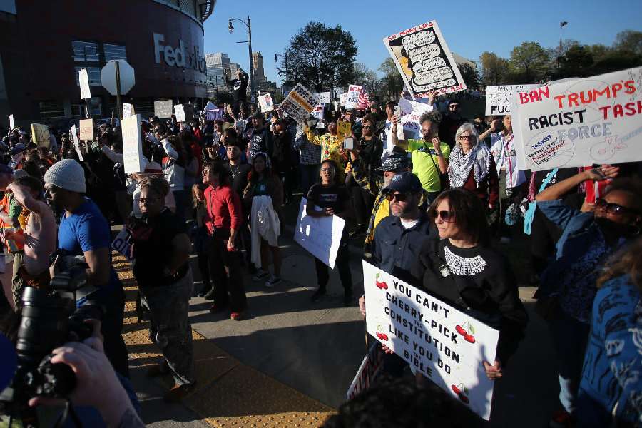 Memphis, Tennessee, USA; A crowd of No Kings protesters chant at Memphis Police outside of FedEx Forum before the game between the Memphis Grizzlies and Chicago Bulls.