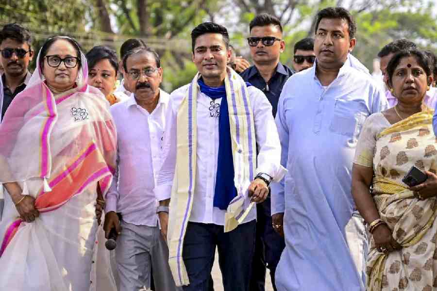 TMC MP Abhishek Banerjee with others during a public rally
