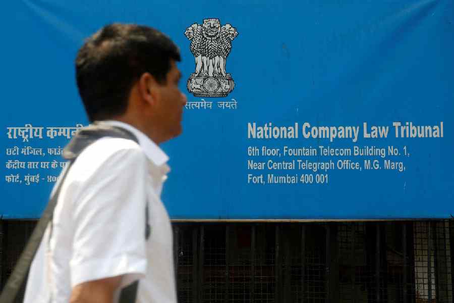 A man walks past the NCLT office in Mumbai.