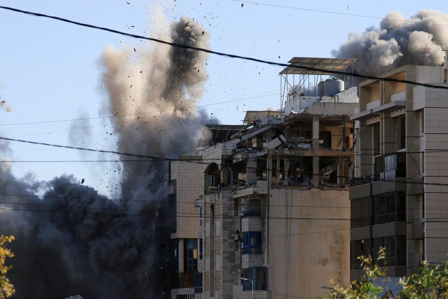 An explosion takes place in a building following an Israeli strike, amid escalating hostilities between Israel and Hezbollah, as the U.S.-Israel conflict with Iran continues, in Beirut, Lebanon, March 31, 2026.