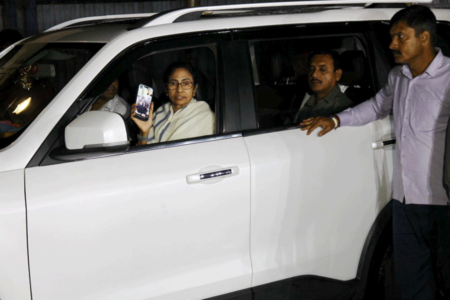 West Bengal Chief Minister and TMC candidate for Bhabanipur constituency, Mamata Banerjee departs as she shows an image of the strong room during her visit to a counting centre within her constituency ahead of the result declaration of state Assembly elections, in Kolkata, Friday, May 1, 2026.