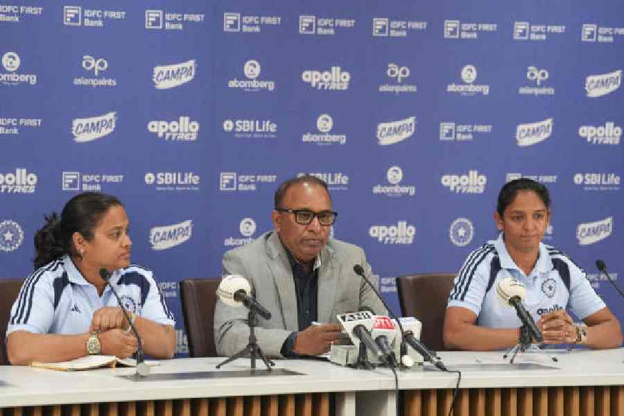 India Women’s skipper Harmanpreet Kaur with BCCI secretary Devajit Saikia (left) at a news conference to announce the squads at the Board headquarters in Mumbai on Saturday.
