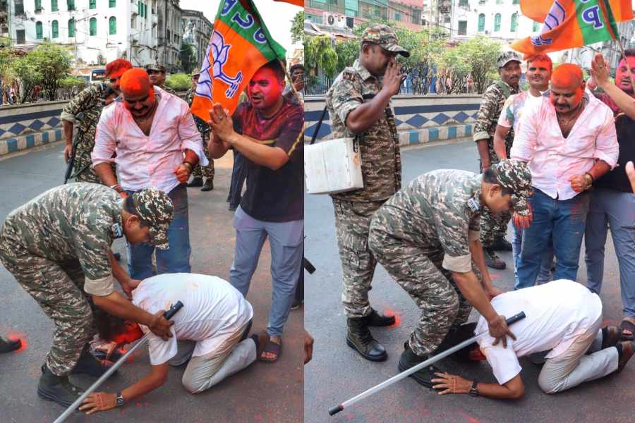 BJP supporters bow in respect to the central forces