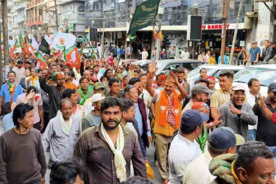 Newly elected BJP MLA Bharat Chettri (hands raised) in Kalimpong on Monday