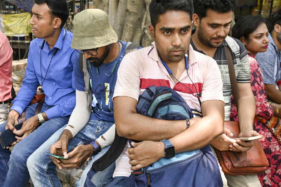 Employees of West Bengal government schools react after the Supreme Court upheld the Calcutta High Court's verdict invalidating the appointment of 25,753 teachers and other staff in West Bengal state-run and state-aided schools, in Kolkata, Thursday, April 3, 2025.